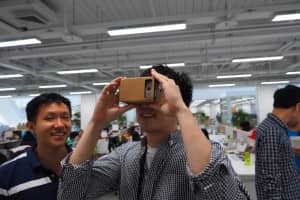 Image of user viewing VR with Google Cardboard device