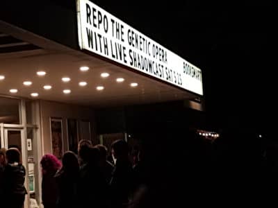 Repo! marquee and line of fans