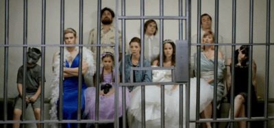 Zoe and Zilla in jail after a trying episode of wedding dress shopping